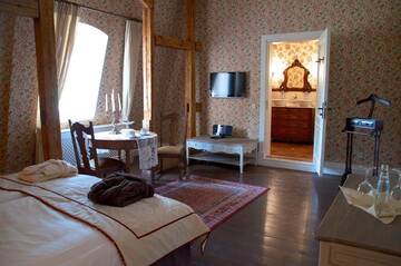 Фото номера Улучшенный двухместный номер с 1 кроватью Отель Liepupe Manor г. Liepupe 6