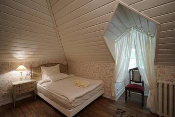 Фото номера Двухместный номер с 1 кроватью, вид на сад Отель Liepupe Manor г. Liepupe 2